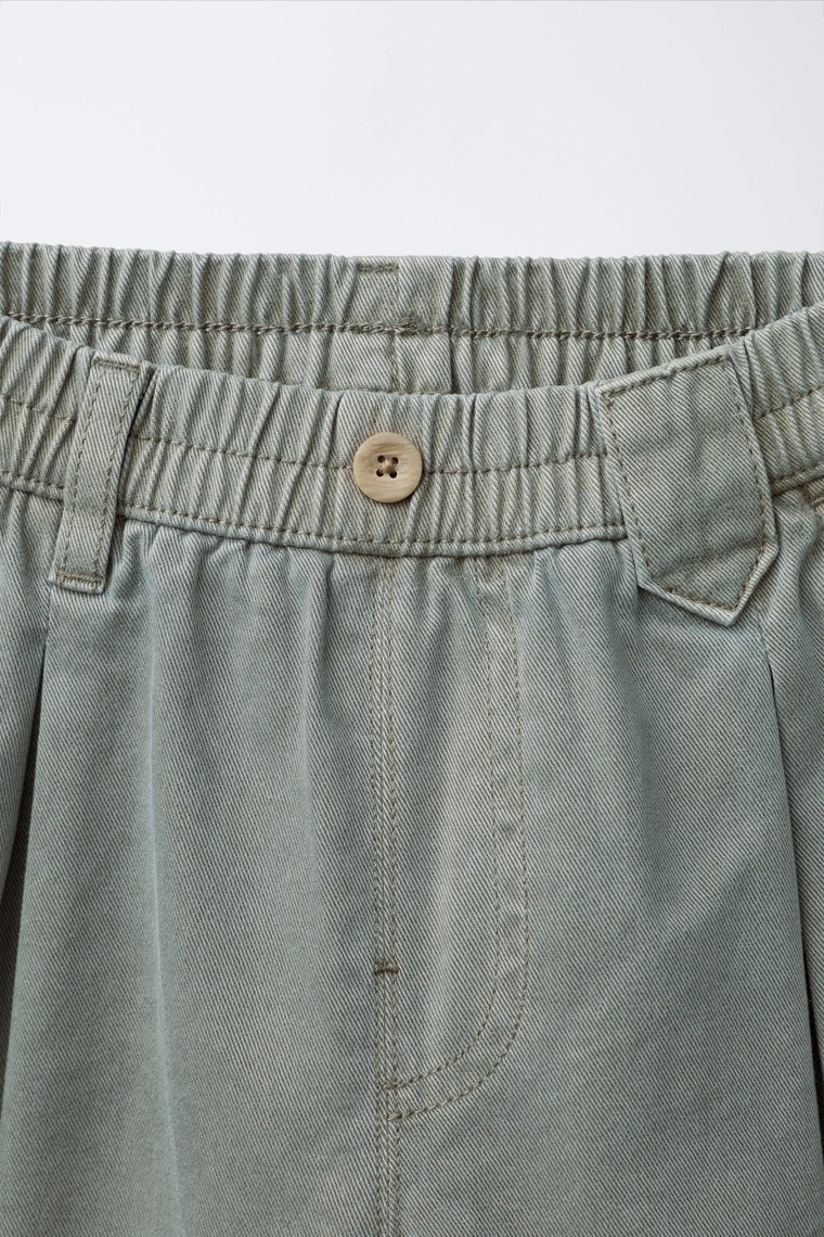 Брюки пышного покроя с проймами