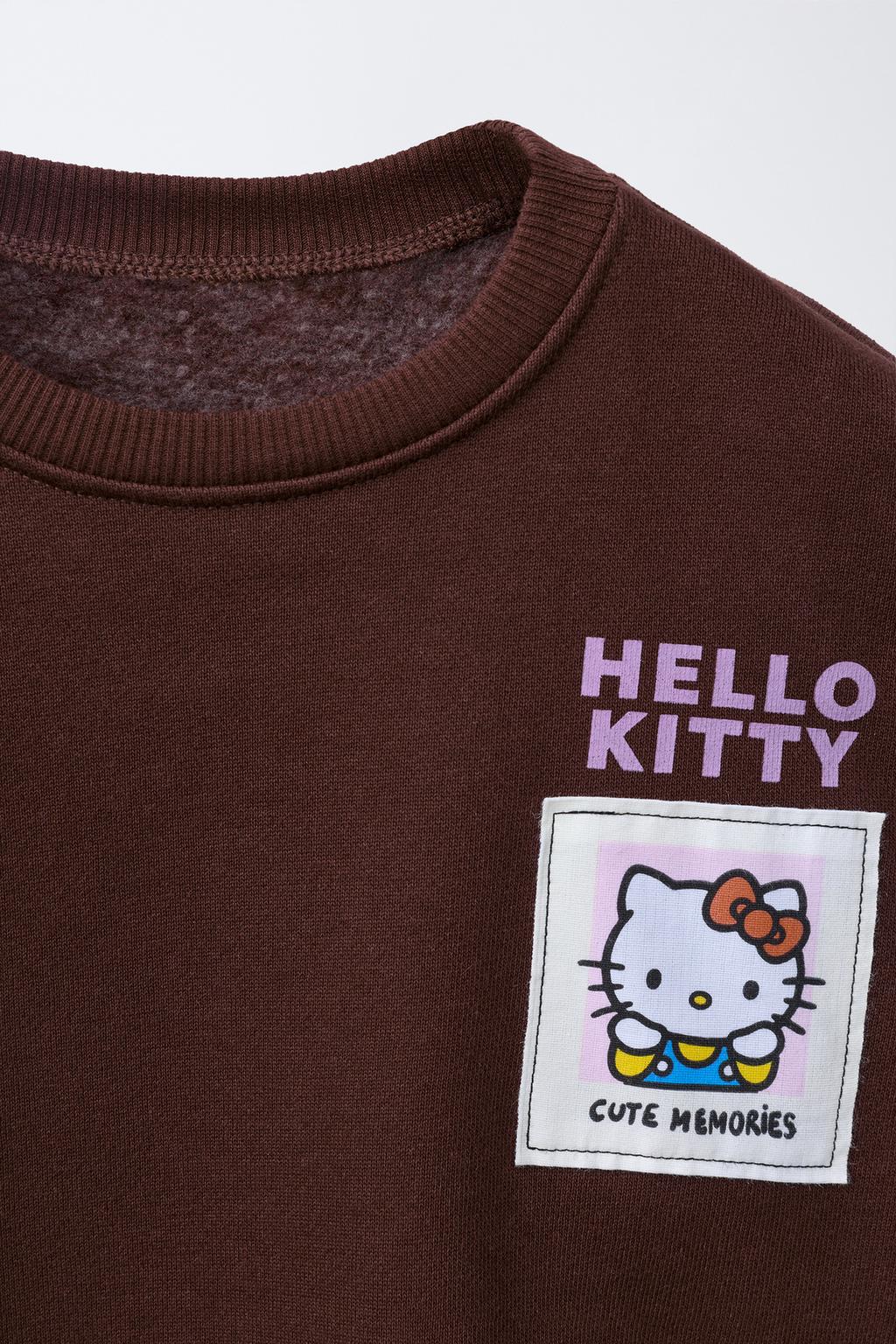 КОМПЛЕКТ ИЗ ТОЛСТОВКИ И ЛЕГГИНСОВ В РУБЧИК HELLO KITTY © SANRIO
