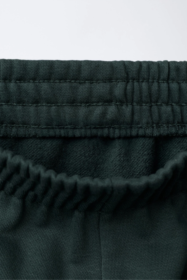 БРЮКИ-ДЖОГГЕРЫ С НАДПИСЬЮ