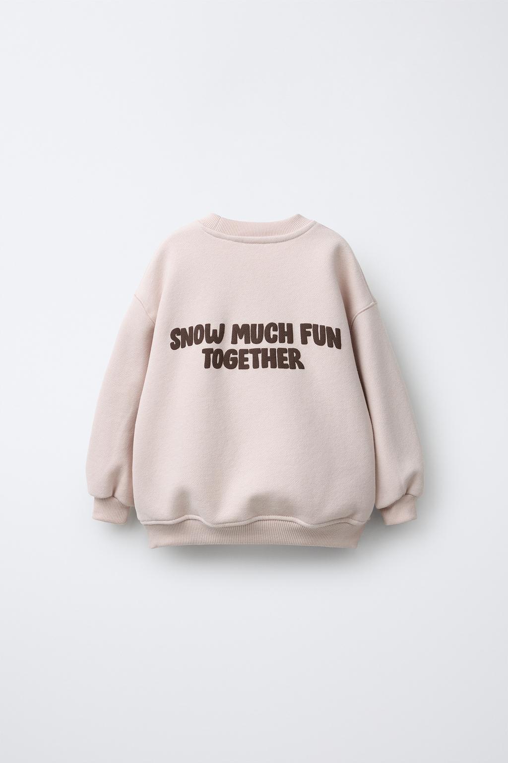 ТОЛСТОВКА С АППЛИКАЦИЕЙ ОЛЕНЯ ИЗ ИСКУССТВЕННОГО МЕХА