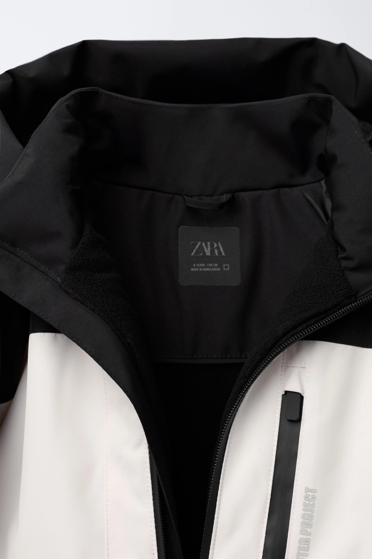 Пуховик с цветными блоками, защищающий от воды и ветра