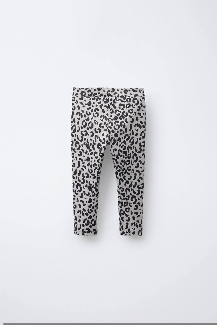 Леггинсы с животным принтом из дышащей ткани