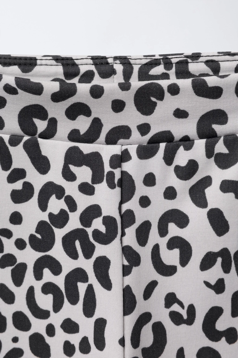 Леггинсы с животным принтом из дышащей ткани