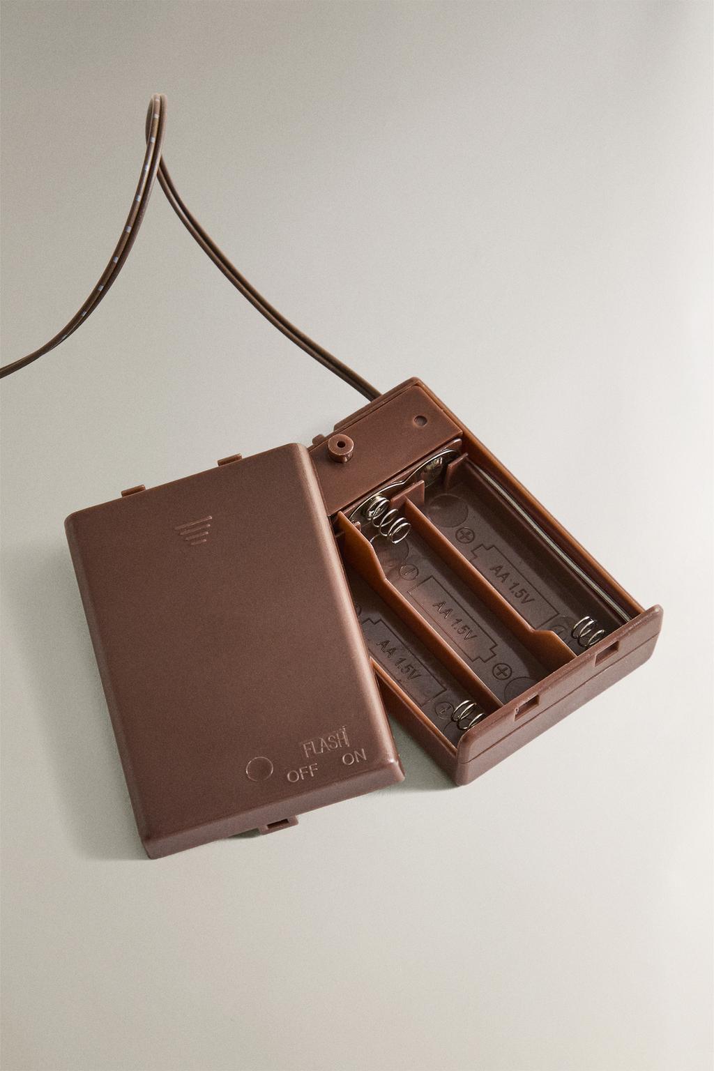 Средняя ветвь с листьями и огоньками