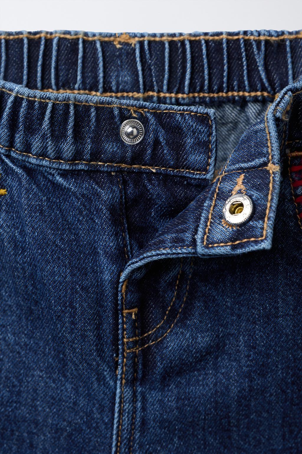 ДЖИНСЫ BAGGY С КОНТРАСТНОЙ ВЫШИВКОЙ