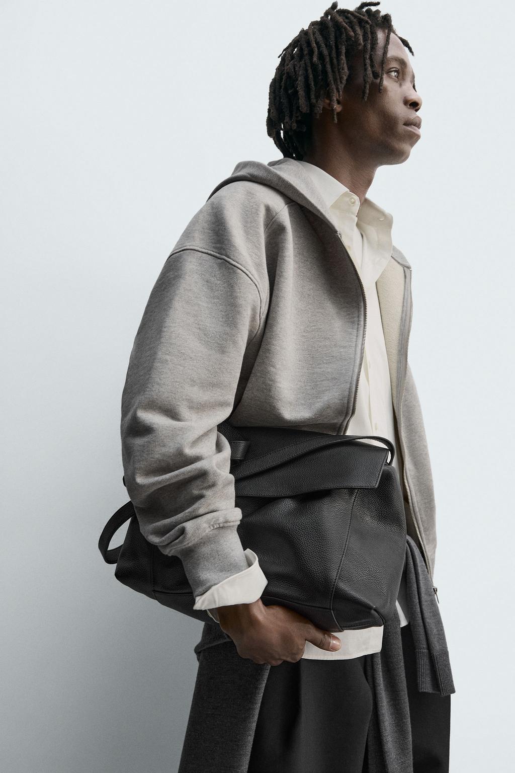 ТОЛСТОВКА НА МОЛНИИ С КАПЮШОНОМ И ЭТИКЕТКОЙ