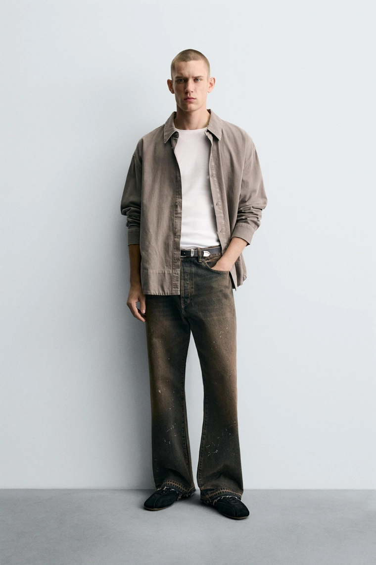 Джинсы свободного кроя с брызгами краски