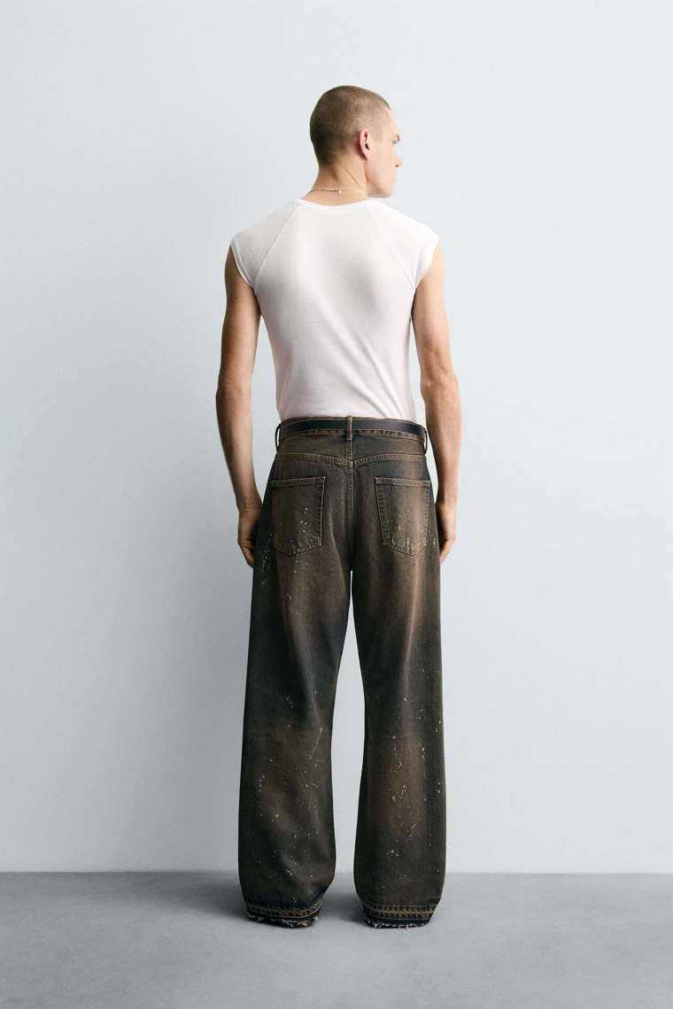 Джинсы свободного кроя с брызгами краски