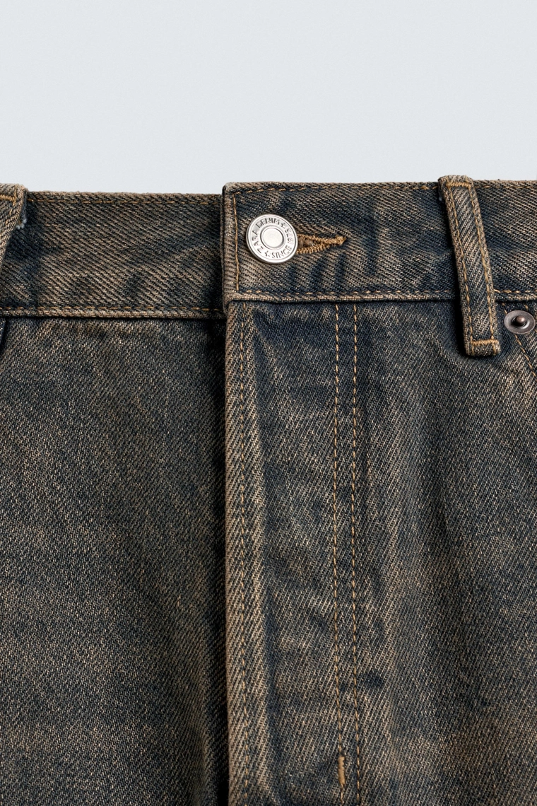 Джинсы свободного кроя с брызгами краски