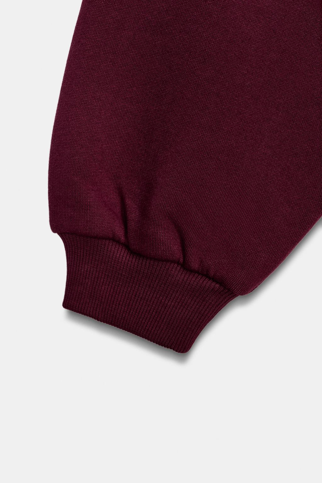 ТОЛСТОВКА В СТИЛЕ ПРЕППИ С ВОЛАНАМИ