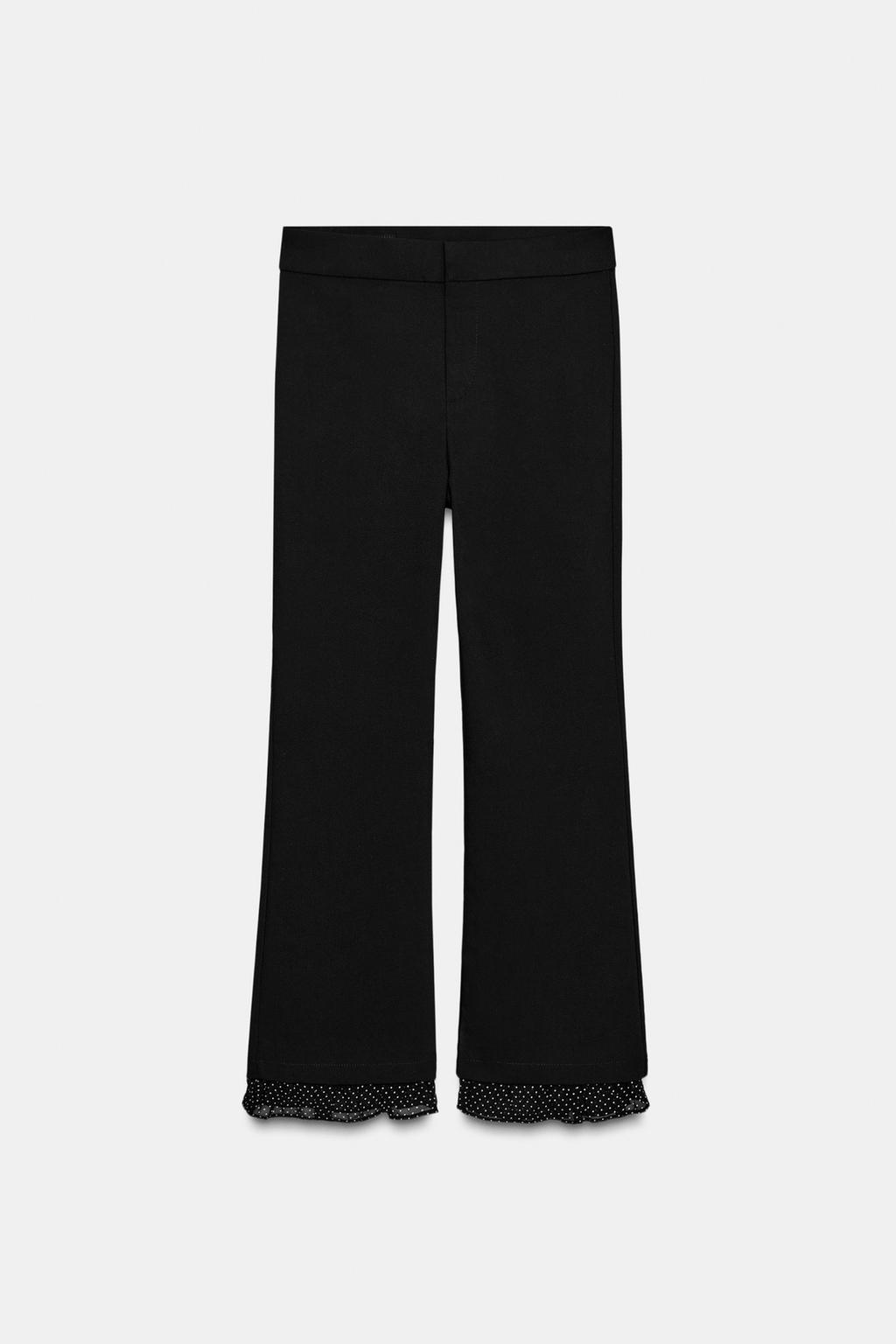 Мини-брюки с расклешенными штанинами и оборкой