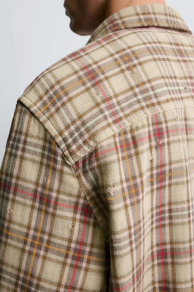 Рубашка в клетку с рваными эффектами