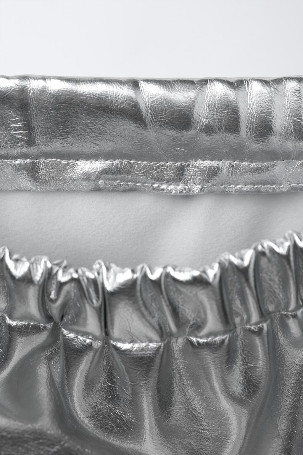 МЕТАЛЛИЗИРОВАННАЯ ЮБКА С БАНТАМИ