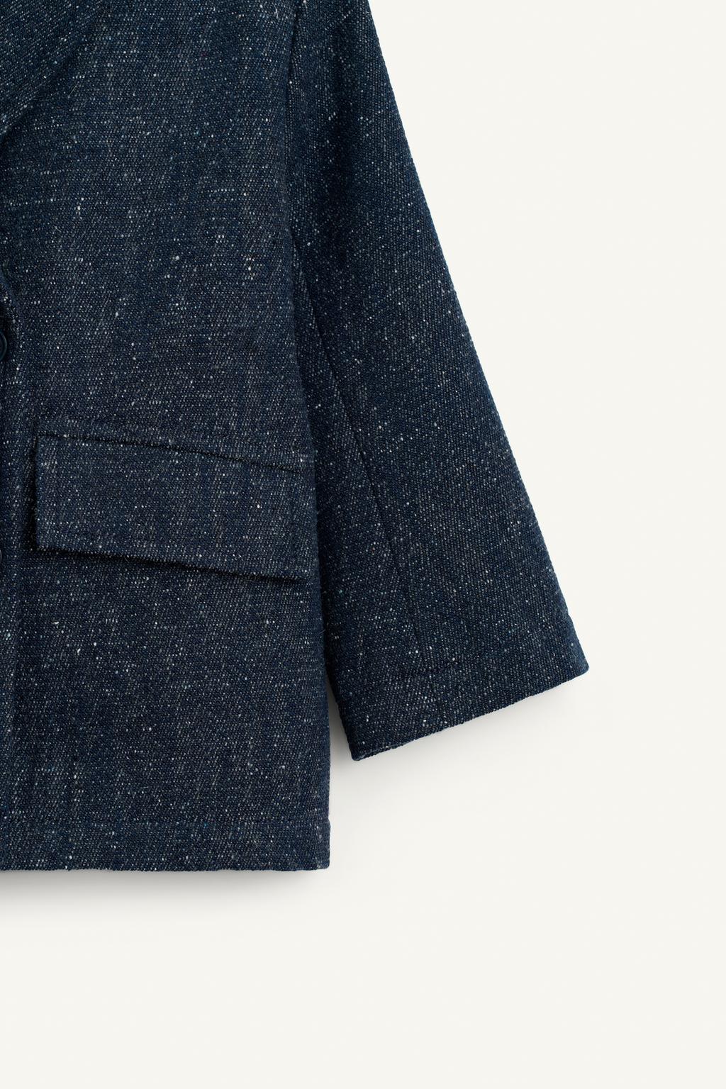 Пальто из меланжевой ткани с лацканами