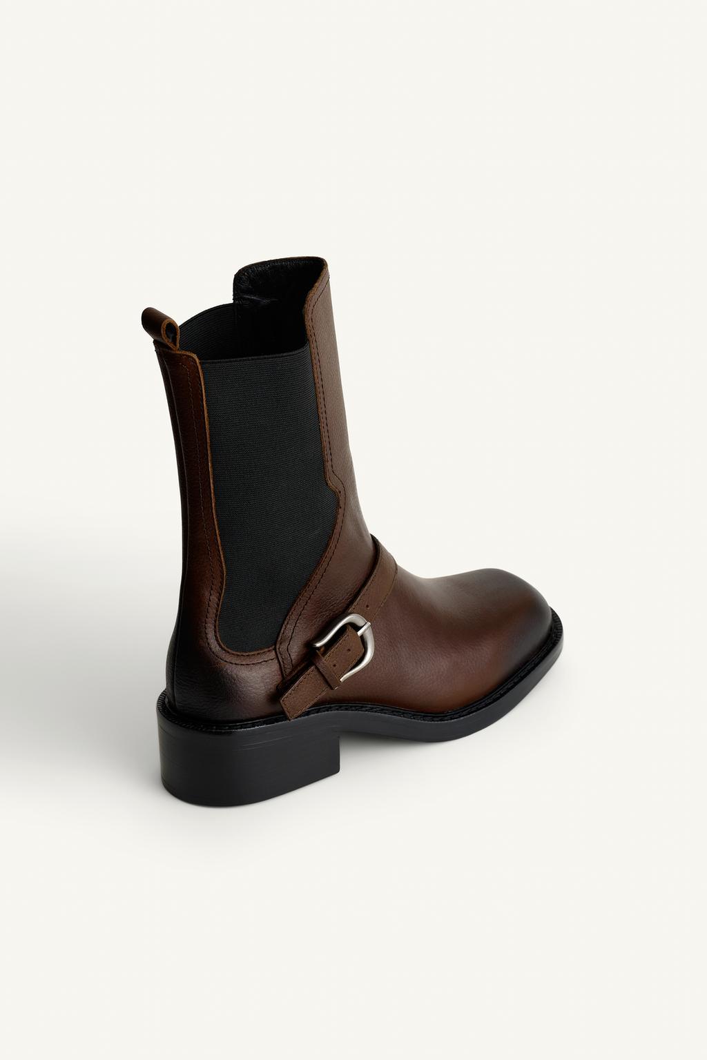 Кожаные сапоги с полоской на шею