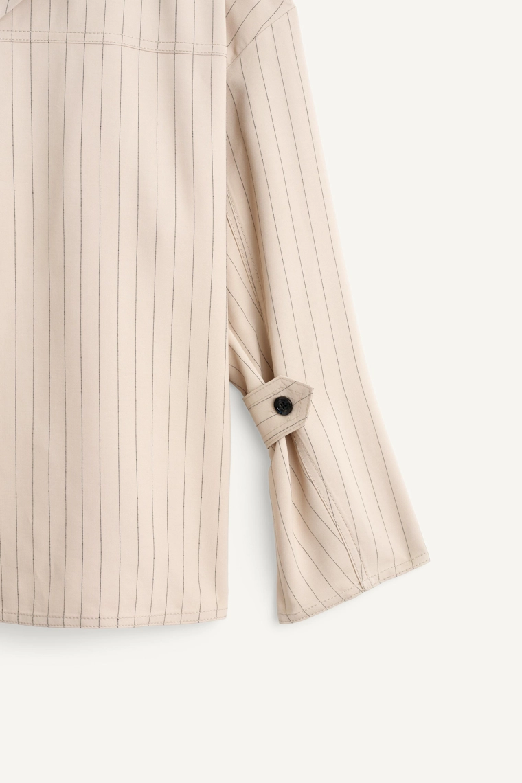 Рубашка с полосками и карманами