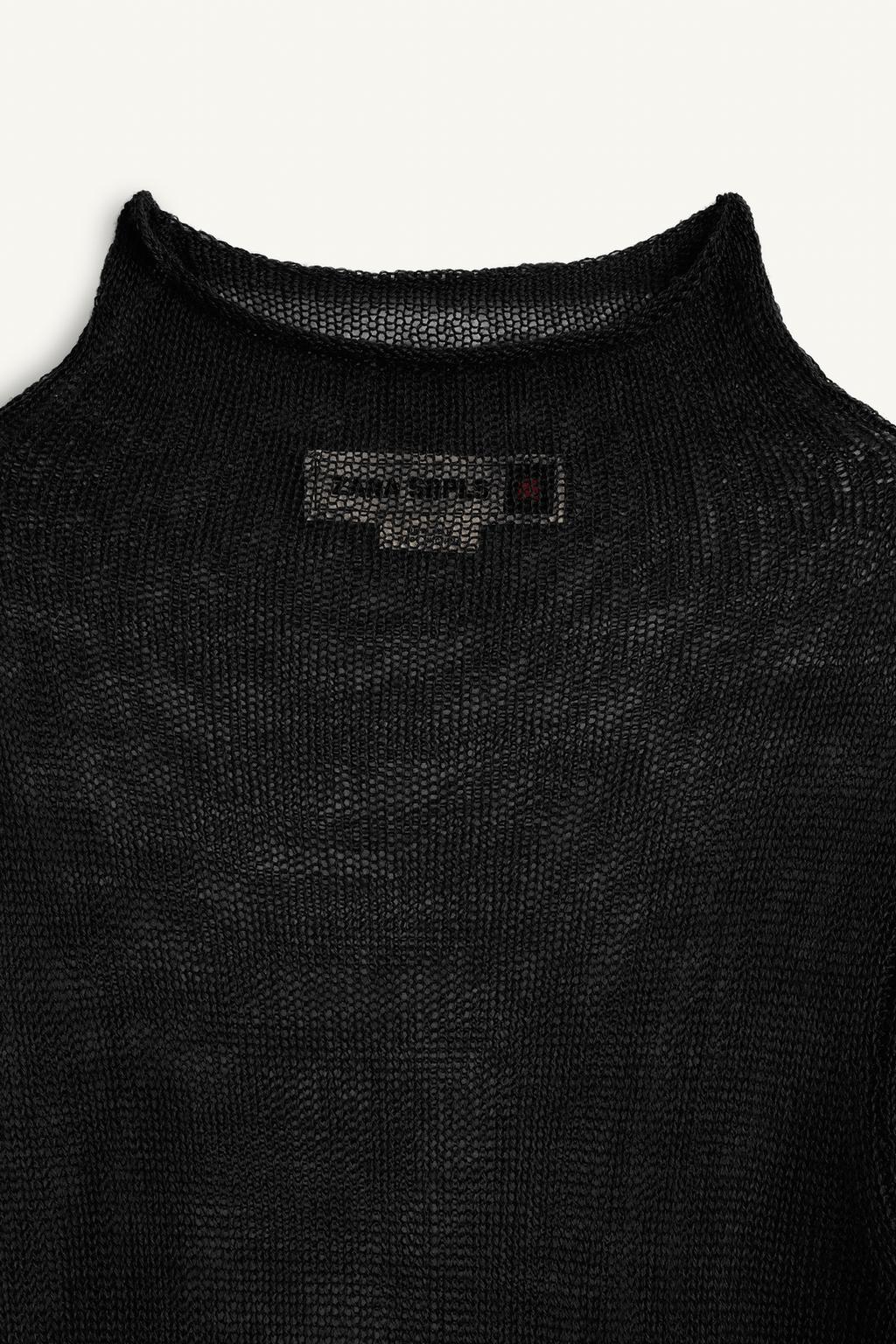 Свитер с высоким воротником