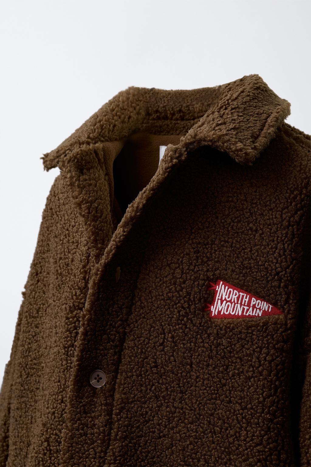 КУРТКА-РУБАШКА ИЗ ИСКУССТВЕННОЙ ОВЧИНЫ С ВЫШИВКОЙ