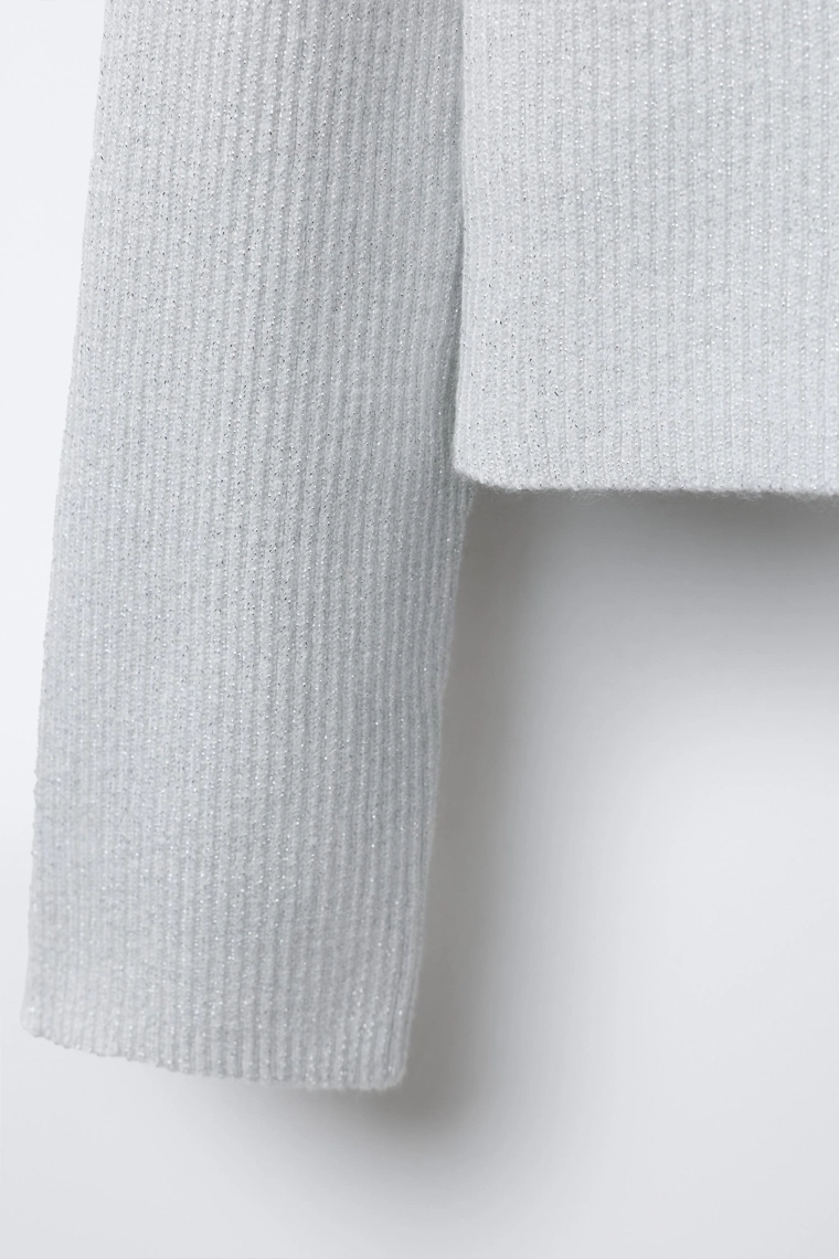 Мерцающий асимметричный свитер