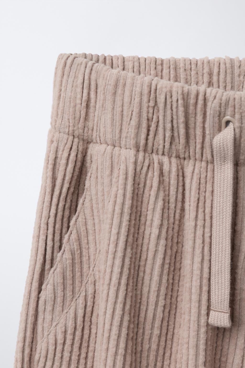 БРЮКИ В РУБЧИК ИЗ МЯГКОЙ ТКАНИ