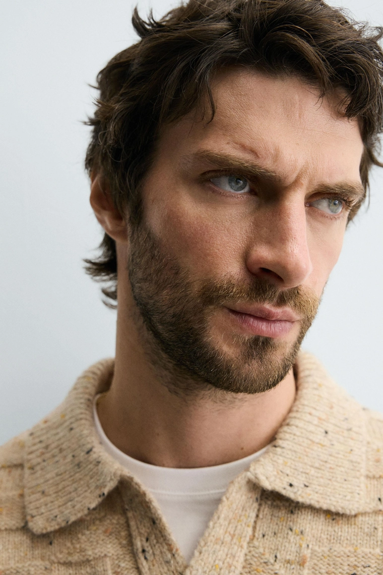 Поло из 100% шерсти с воротником и пуговицами