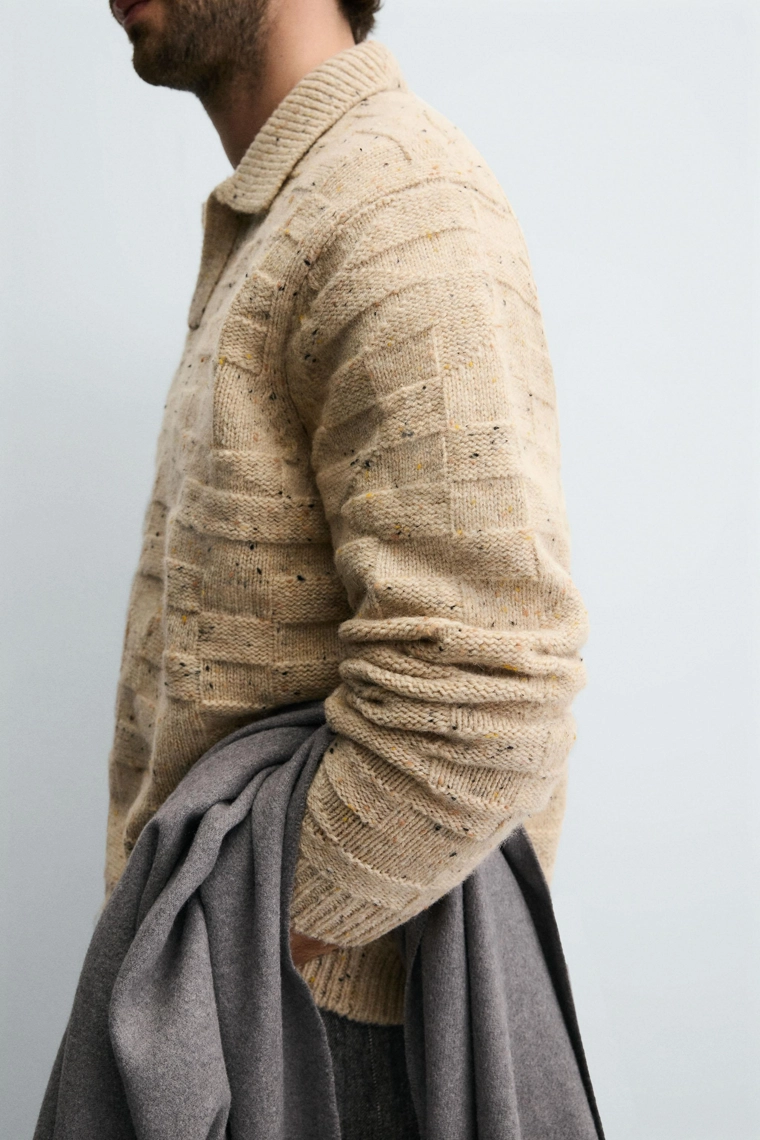 Поло из 100% шерсти с воротником и пуговицами