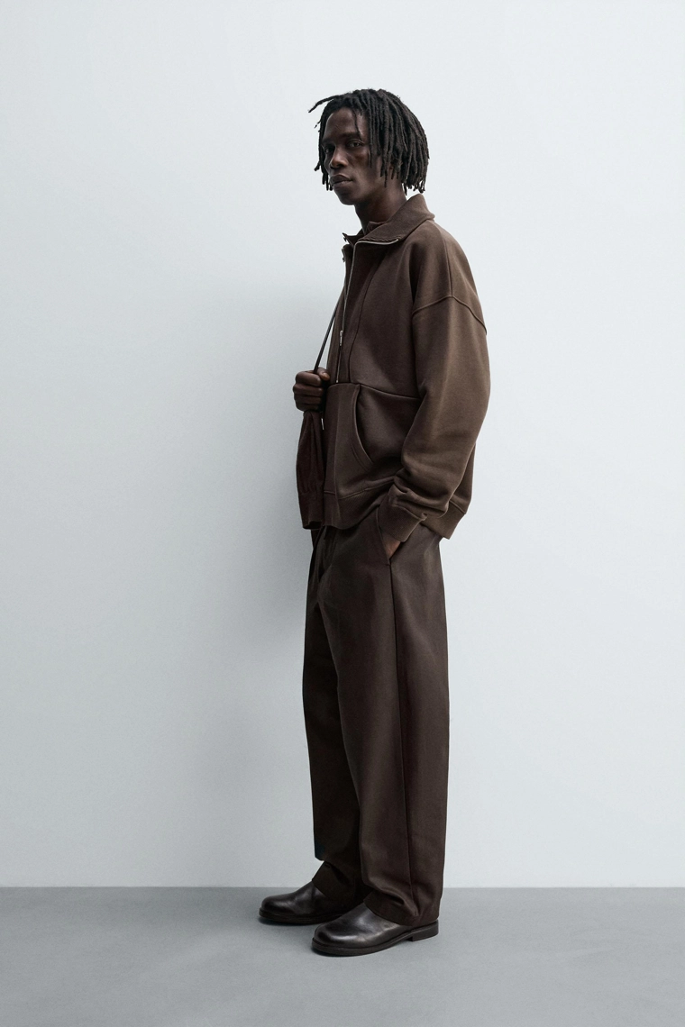 Свитшот с молнией на четверть и ребристыми манжетами