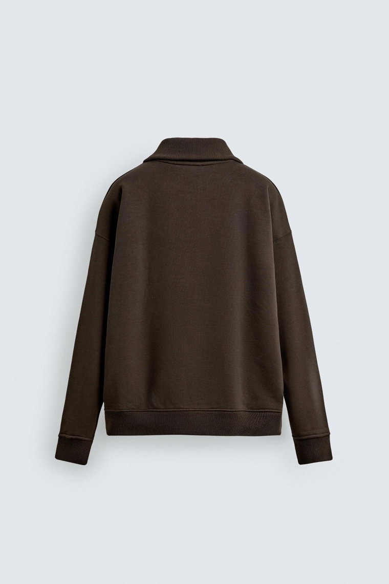 Свитшот с молнией на четверть и ребристыми манжетами