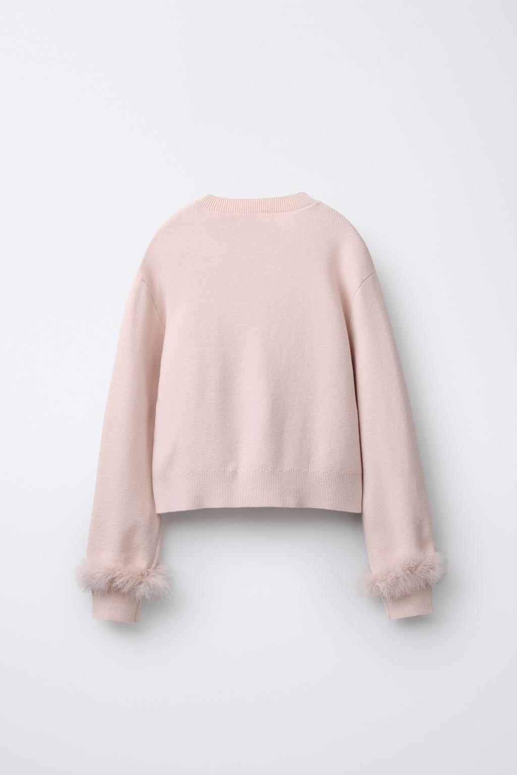 ВЯЗАНЫЙ ДЖЕРСИ С ПЕРЬЯМИ