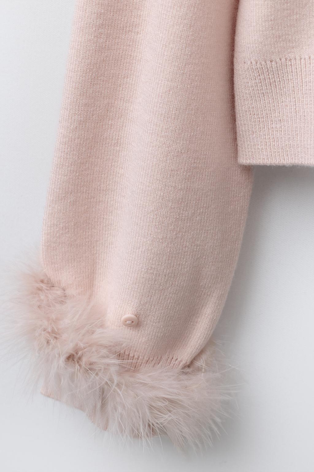 ВЯЗАНЫЙ ДЖЕРСИ С ПЕРЬЯМИ