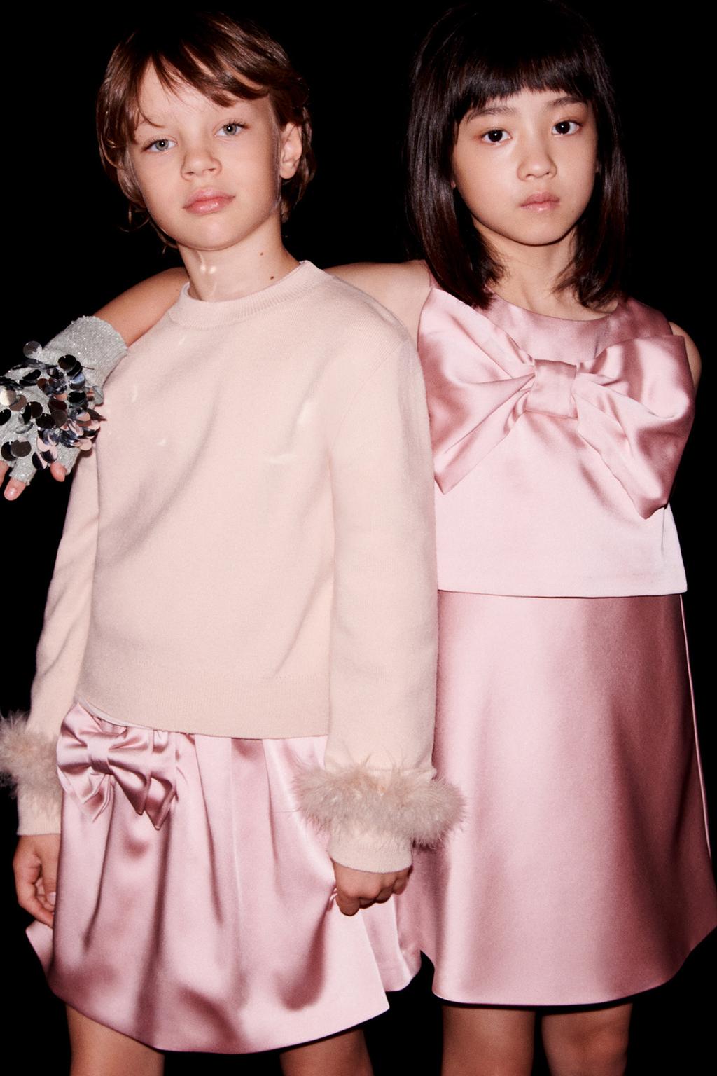 ВЯЗАНЫЙ ДЖЕРСИ С ПЕРЬЯМИ