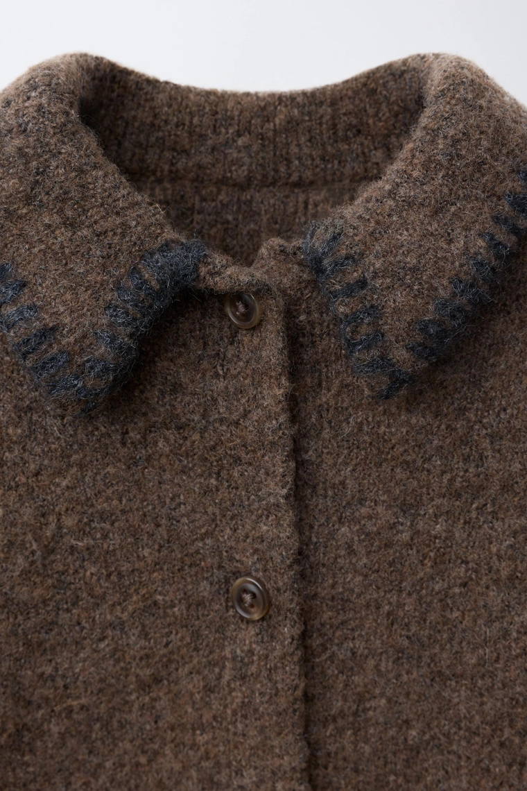 Комбинезон из вязаного материала с контрастными деталями