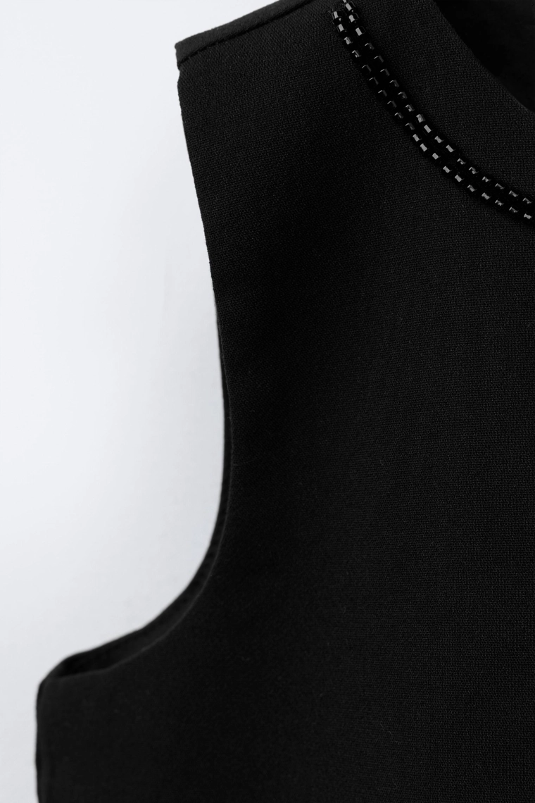 Топ с бантом и бисером