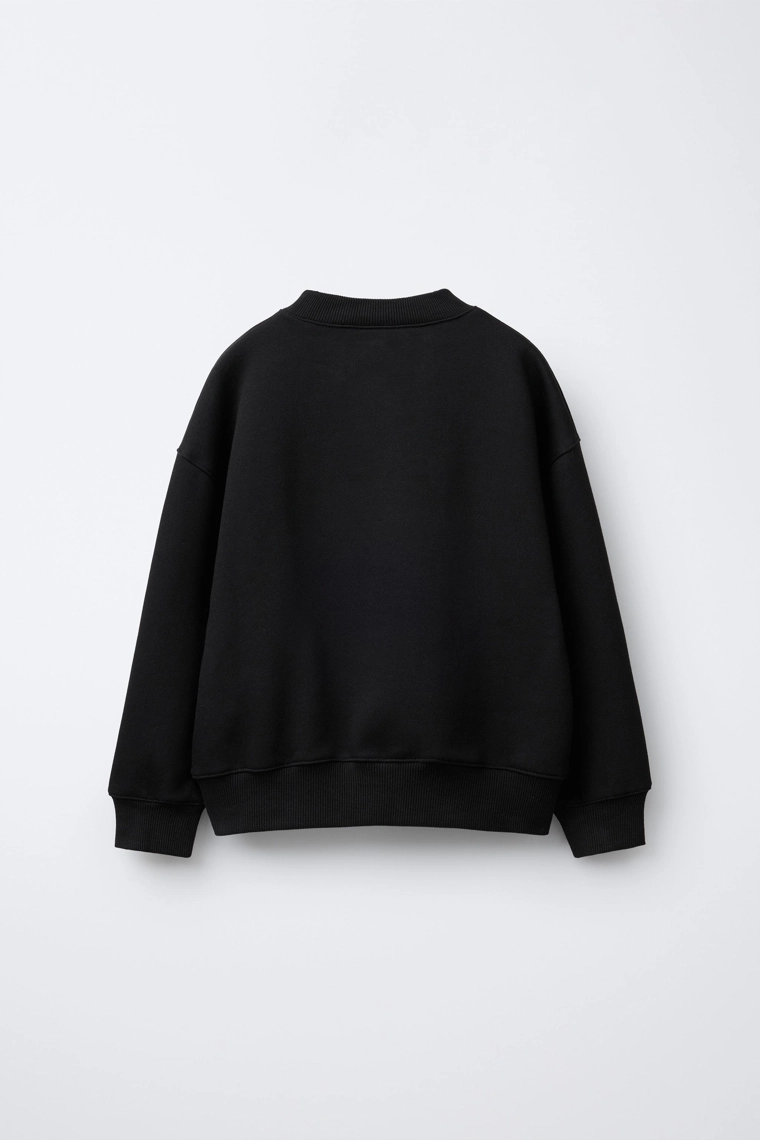 Свитшот с аппликацией в виде банта и шнурком