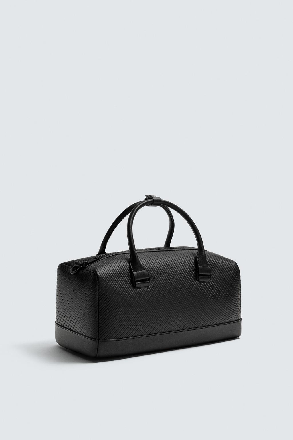 ПРОРЕЗИНЕННАЯ СУМКА ИЗ РЕЛЬЕФНОЙ ТКАНИ