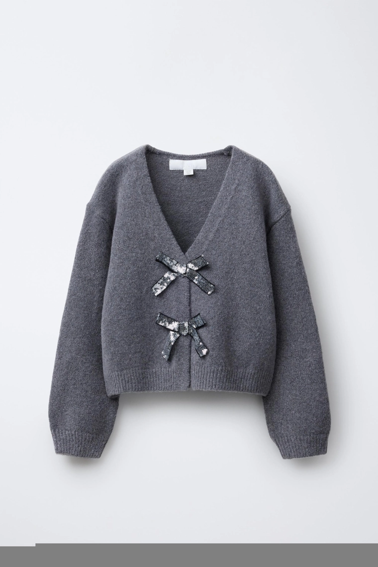 Вязанный кардиган с v-образным вырезом и блестящими бантами
