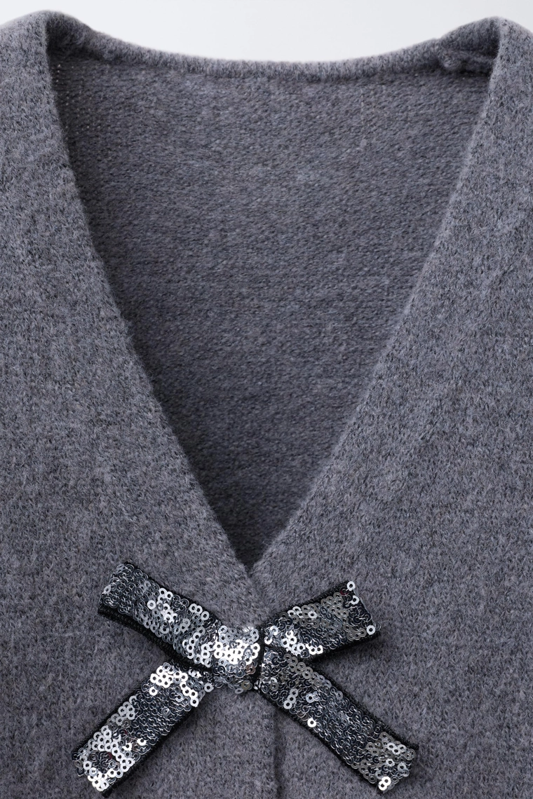 Вязанный кардиган с v-образным вырезом и блестящими бантами