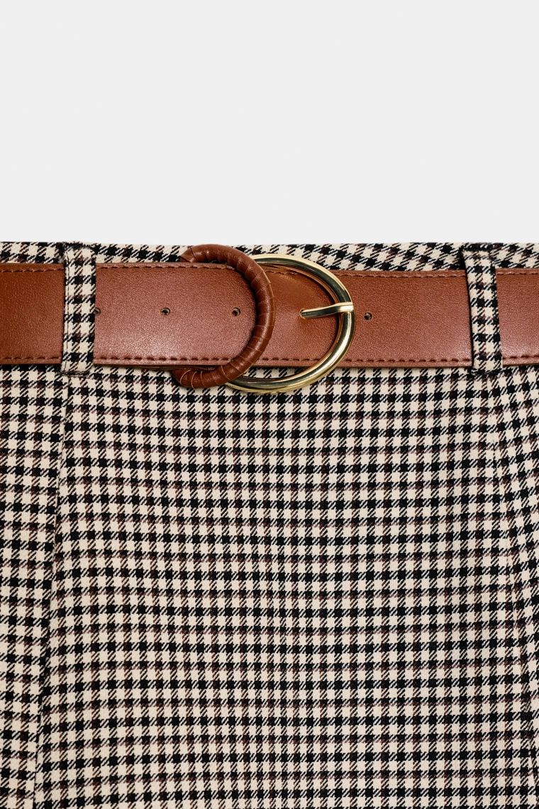 Юбка-плащ с поясом и оборкой в области колена