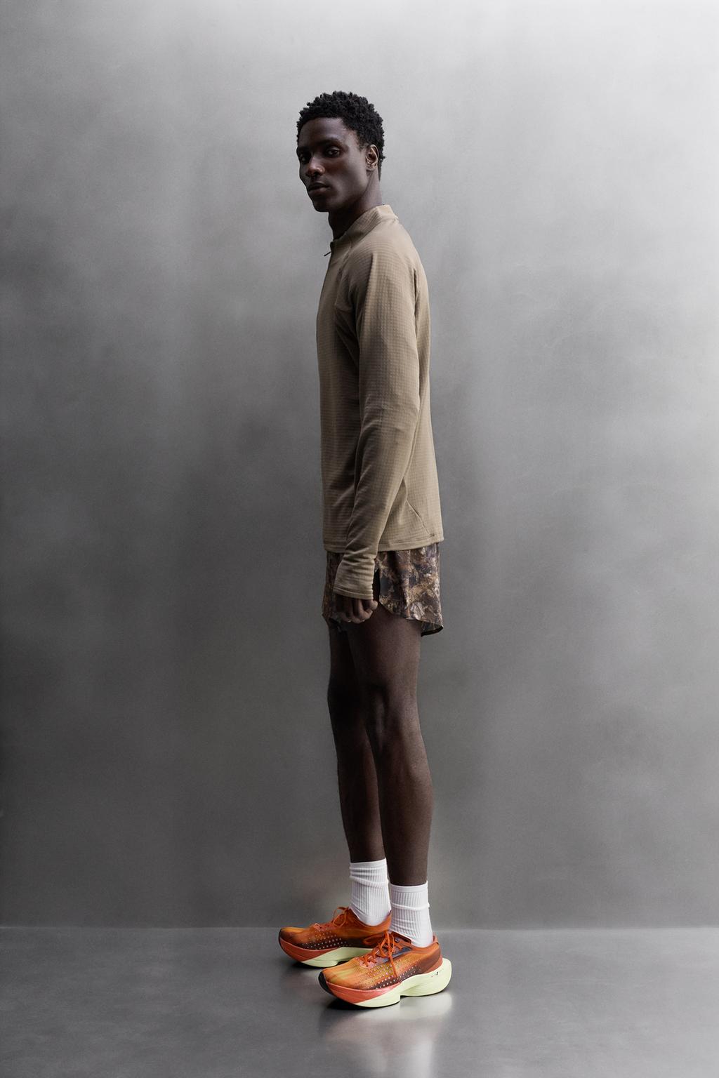 БЕГОВЫЕ ШОРТЫ С ПРИНТОМ В ВИДЕ ДЕРЕВЬЕВ