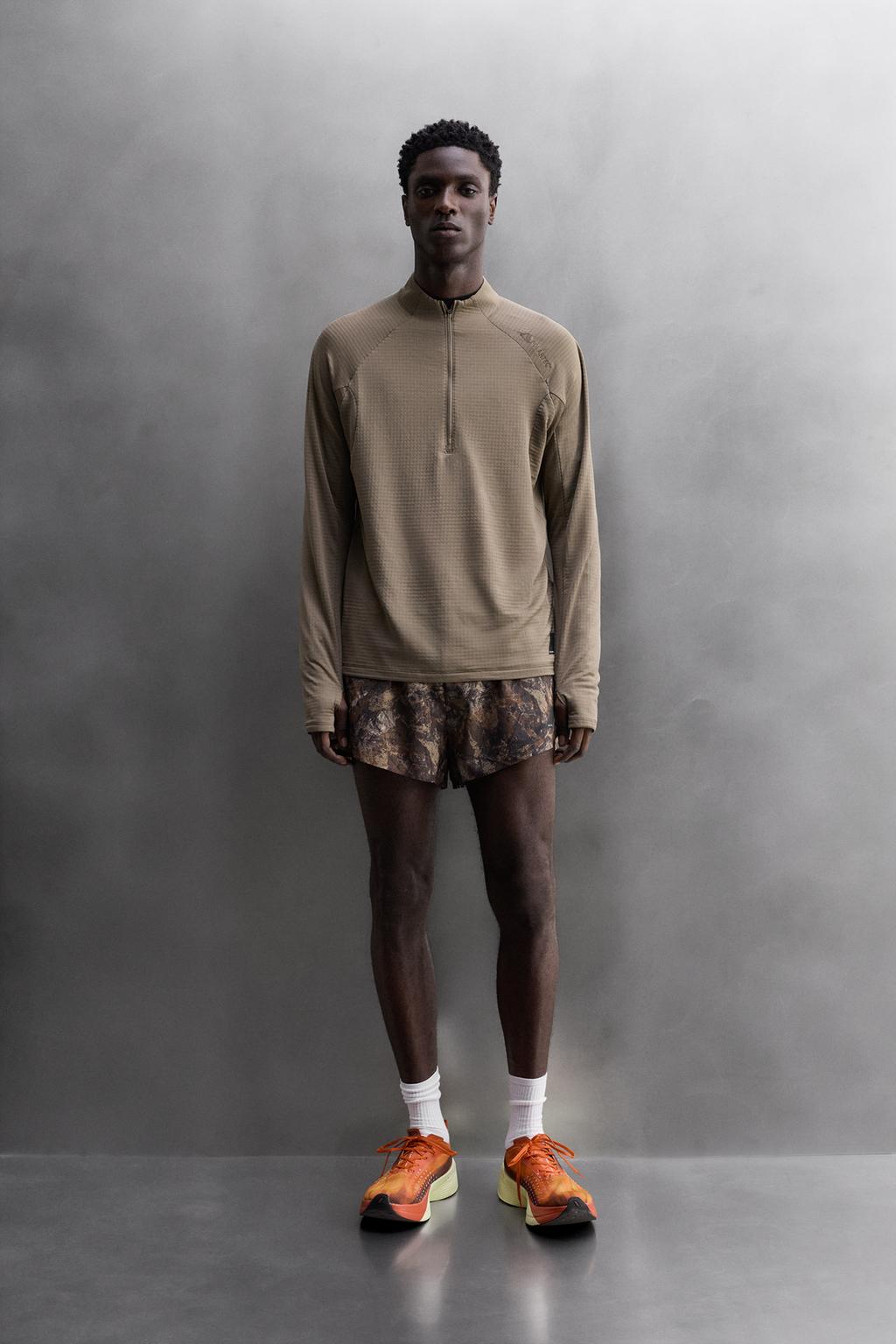 БЕГОВЫЕ ШОРТЫ С ПРИНТОМ В ВИДЕ ДЕРЕВЬЕВ