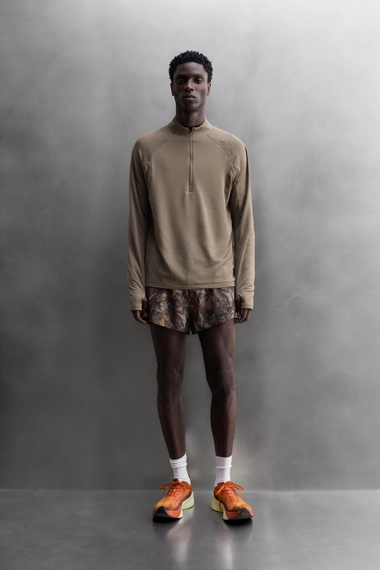 БЕГОВЫЕ ШОРТЫ С ПРИНТОМ В ВИДЕ ДЕРЕВЬЕВ