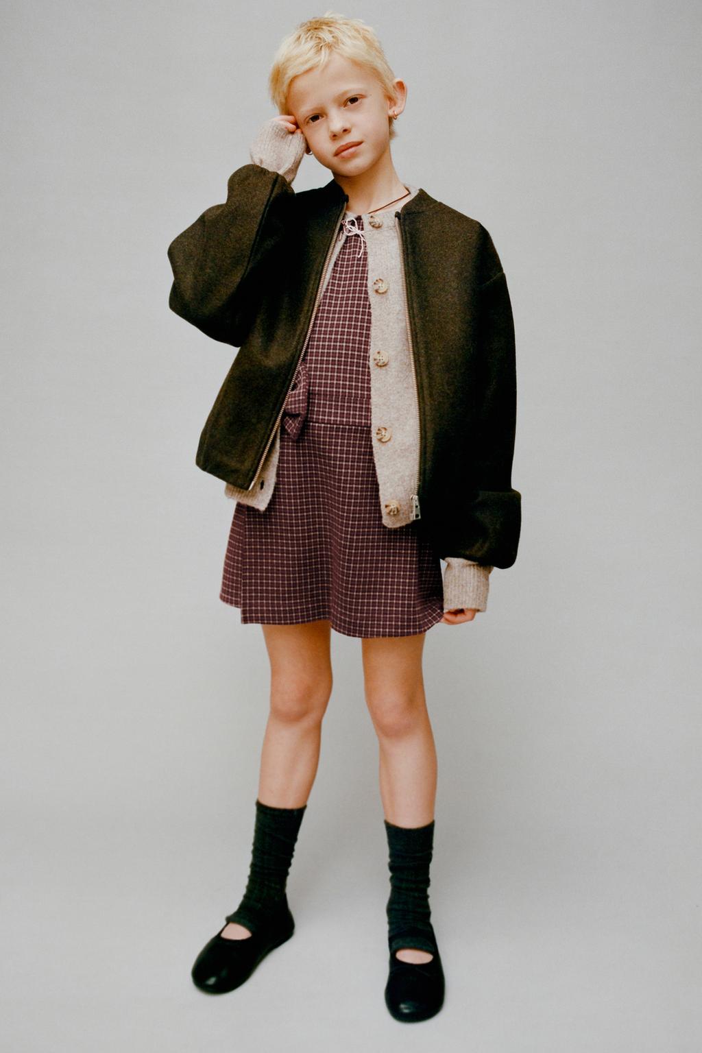 КОРОТКИЙ КОМБИНЕЗОН В КЛЕТКУ С БАНТОМ