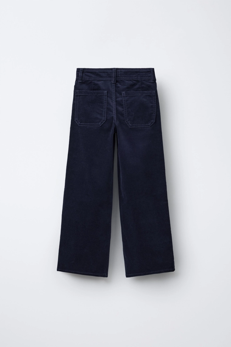 БАРХАТНЫЕ БРЮКИ С ВЫШИВКОЙ В ВИДЕ ЦВЕТОВ