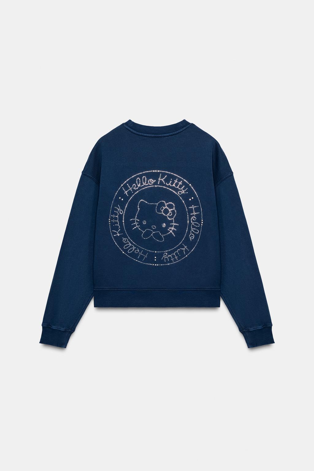 ТОЛСТОВКА HELLO KITTY © 2025 SANRIO С ЭФФЕКТОМ ПОТЕРТОСТИ