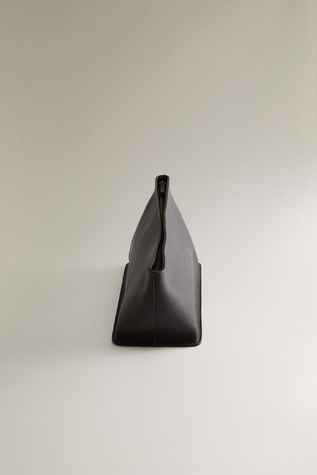 Кожаная сумка для косметики