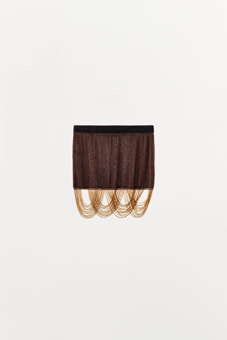 МИНИ-ЮБКА С БУСИНАМИ И БАХРОМОЙ