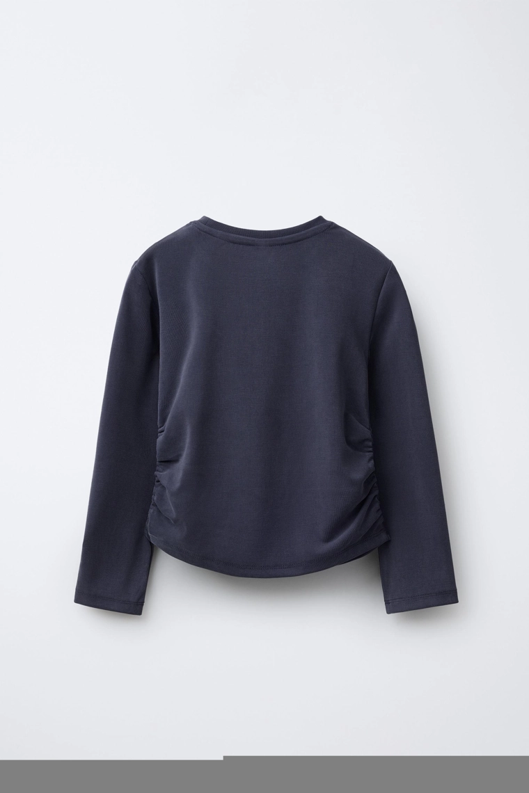 СПОРТИВНАЯ ФУТБОЛКА СО СБОРКАМИ