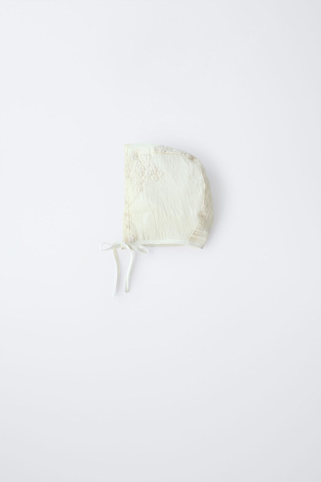 Шапка с регулируемыми передними завязками