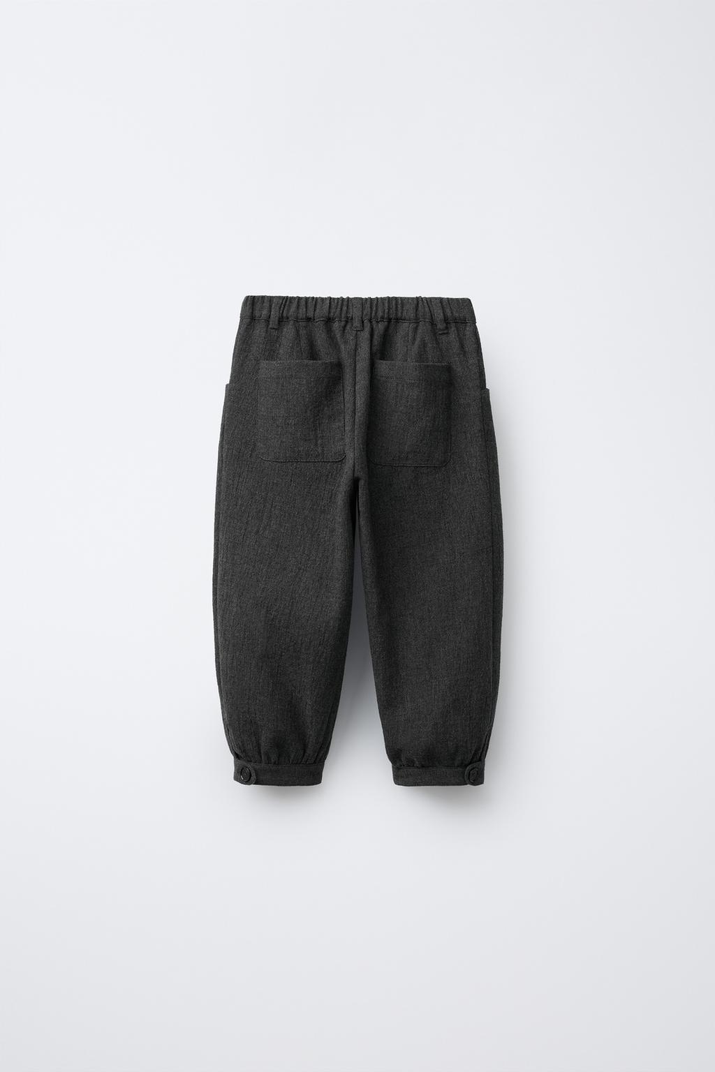 ФАКТУРНЫЕ БРЮКИ С ЗАЩИПАМИ