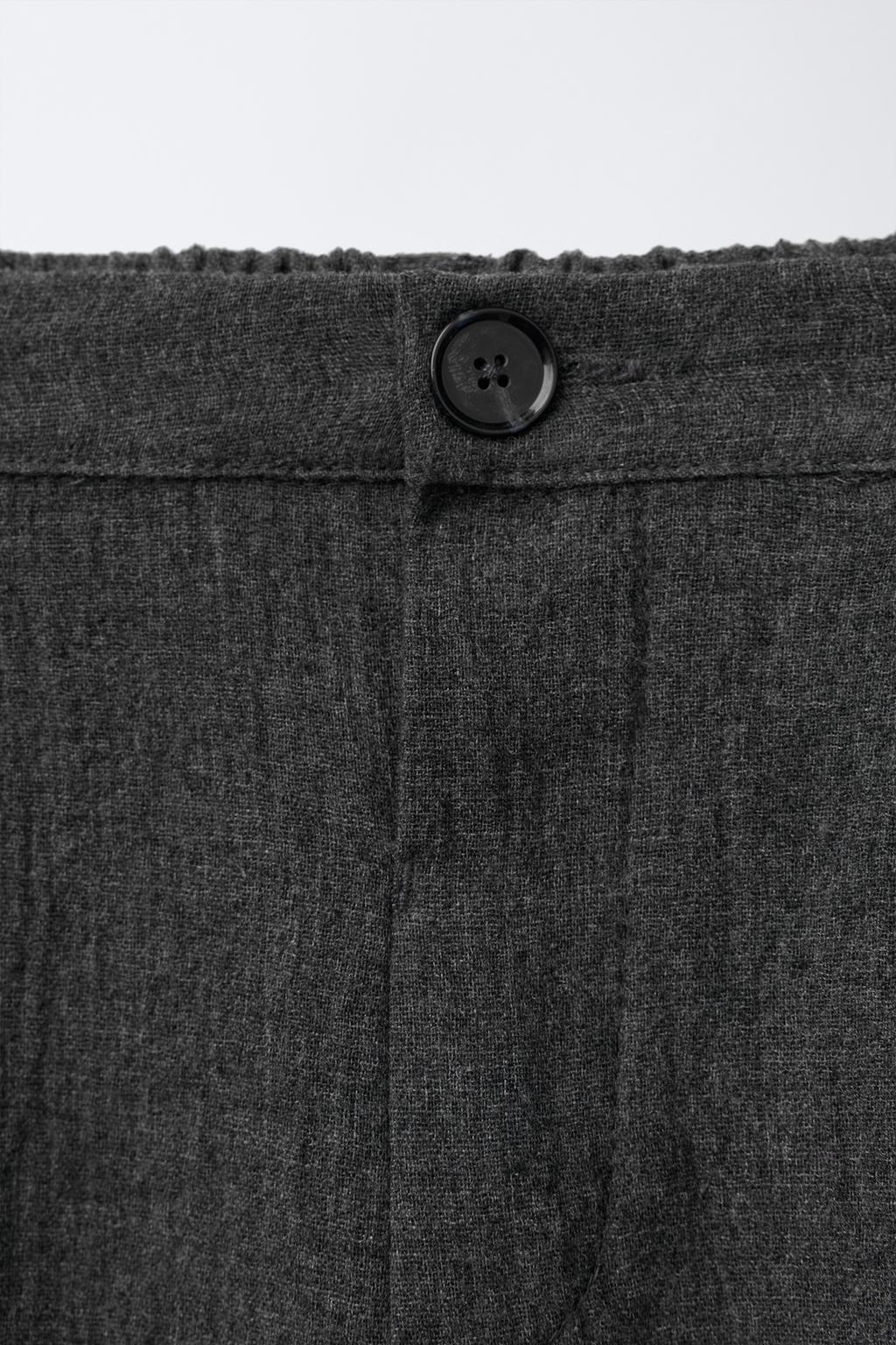 ФАКТУРНЫЕ БРЮКИ С ЗАЩИПАМИ